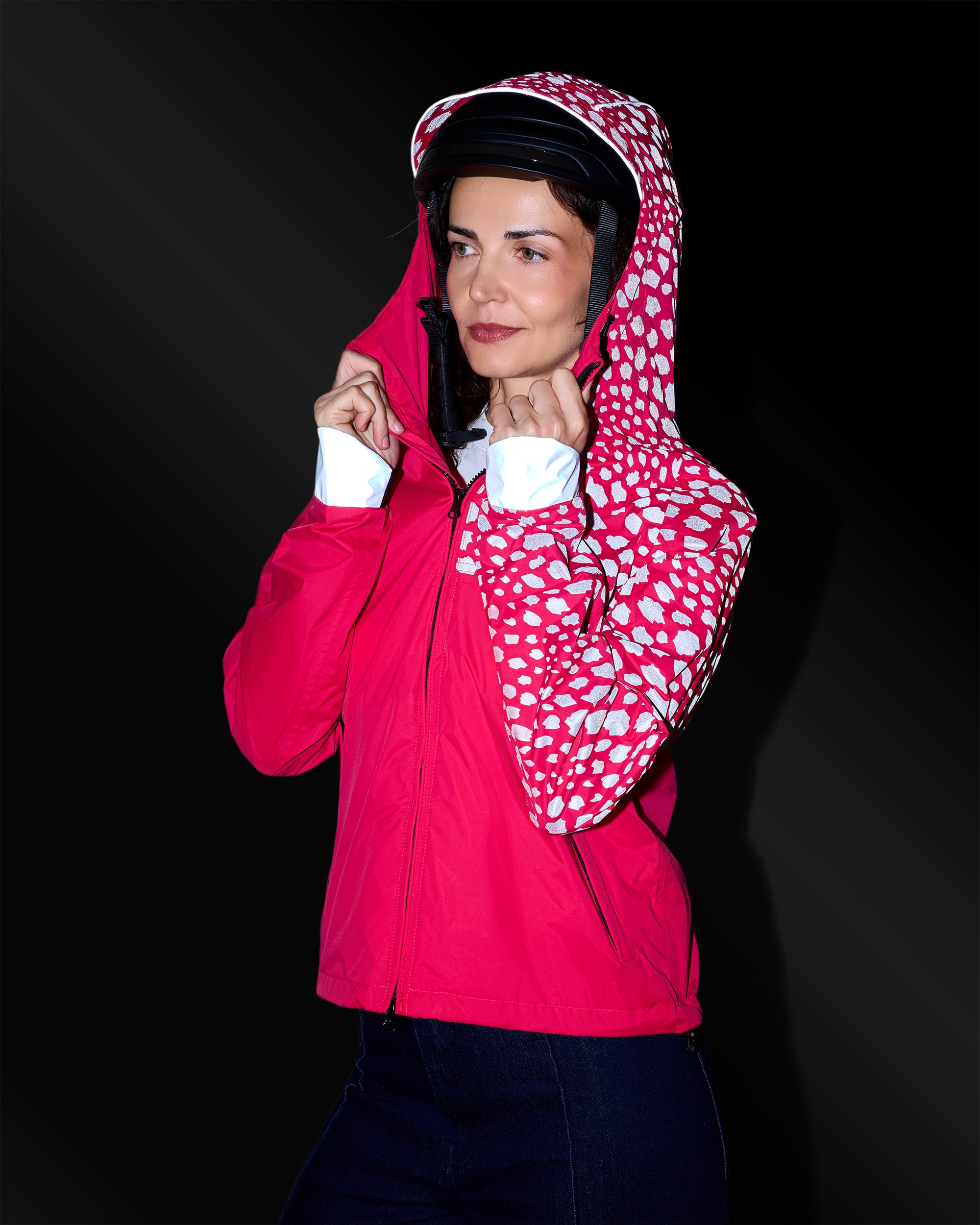 Anorak coupe-vent imperméable à motifs réfléchissants et grande capuche qui passe sur le casque