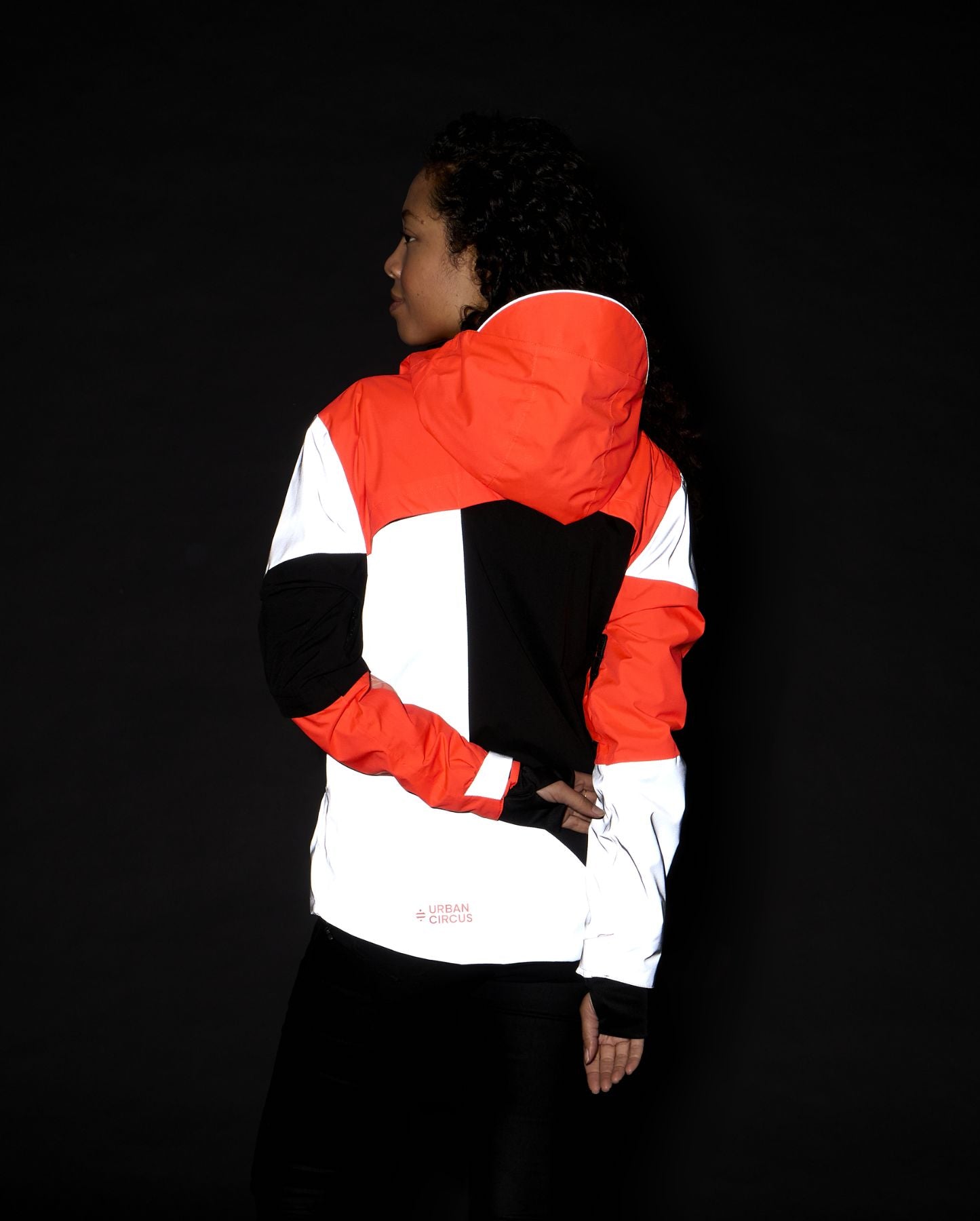 veste technique empiècements réfléchissants dos orange de nuit