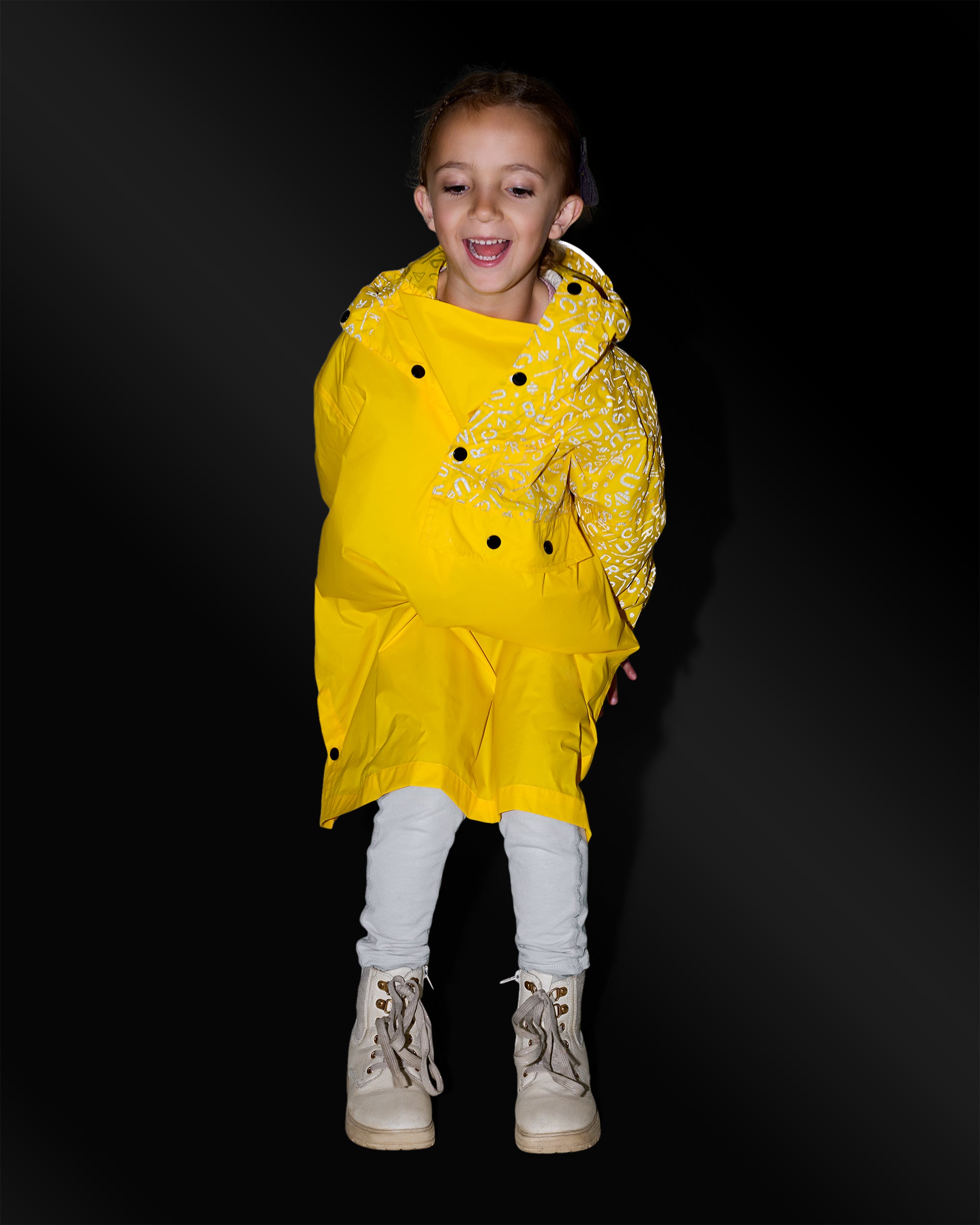 cape de pluie pour enfant jaune motifs réfléchissants 