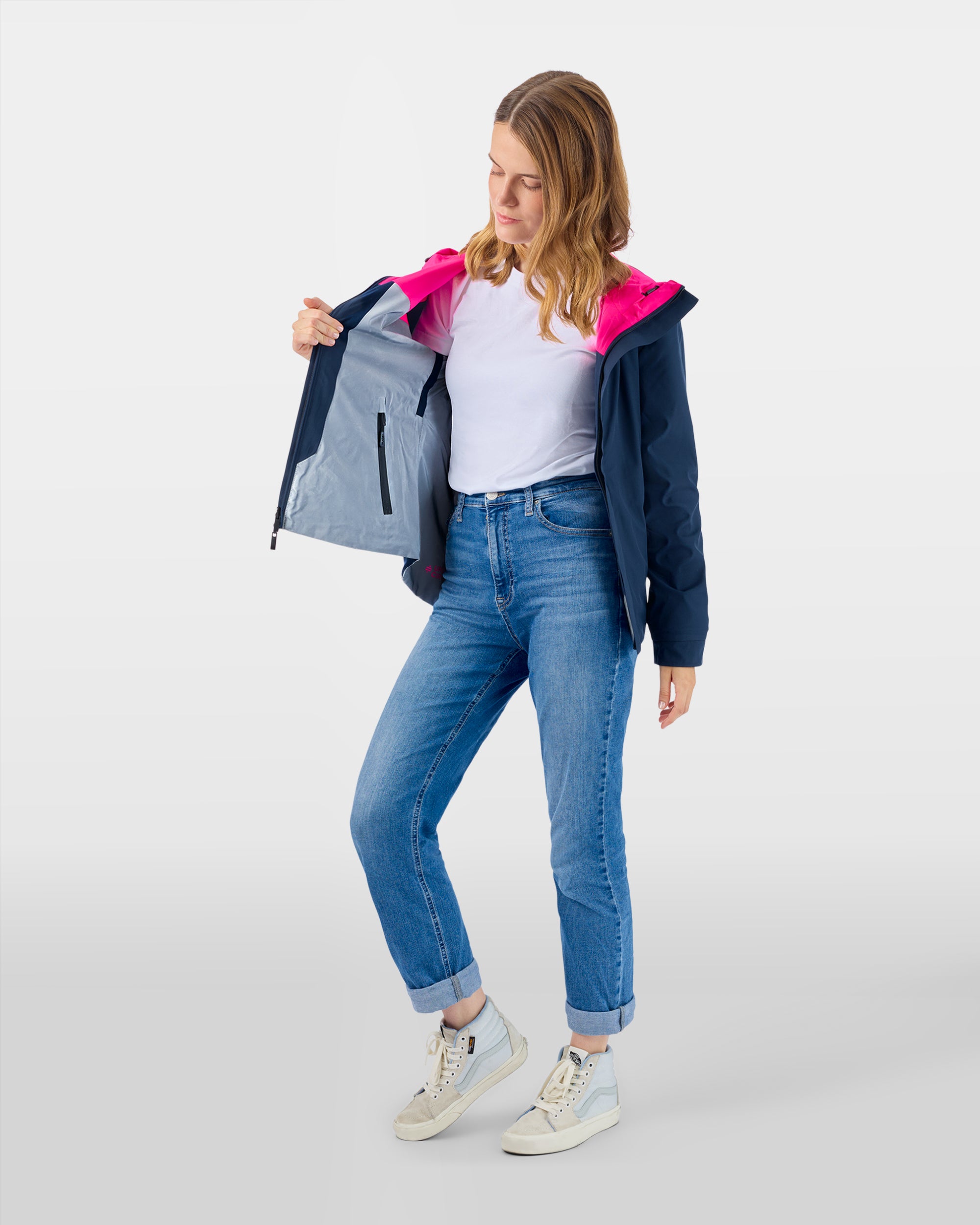 Veste vélo ville visible rose fluo réversible sobre bleue marine sur femme